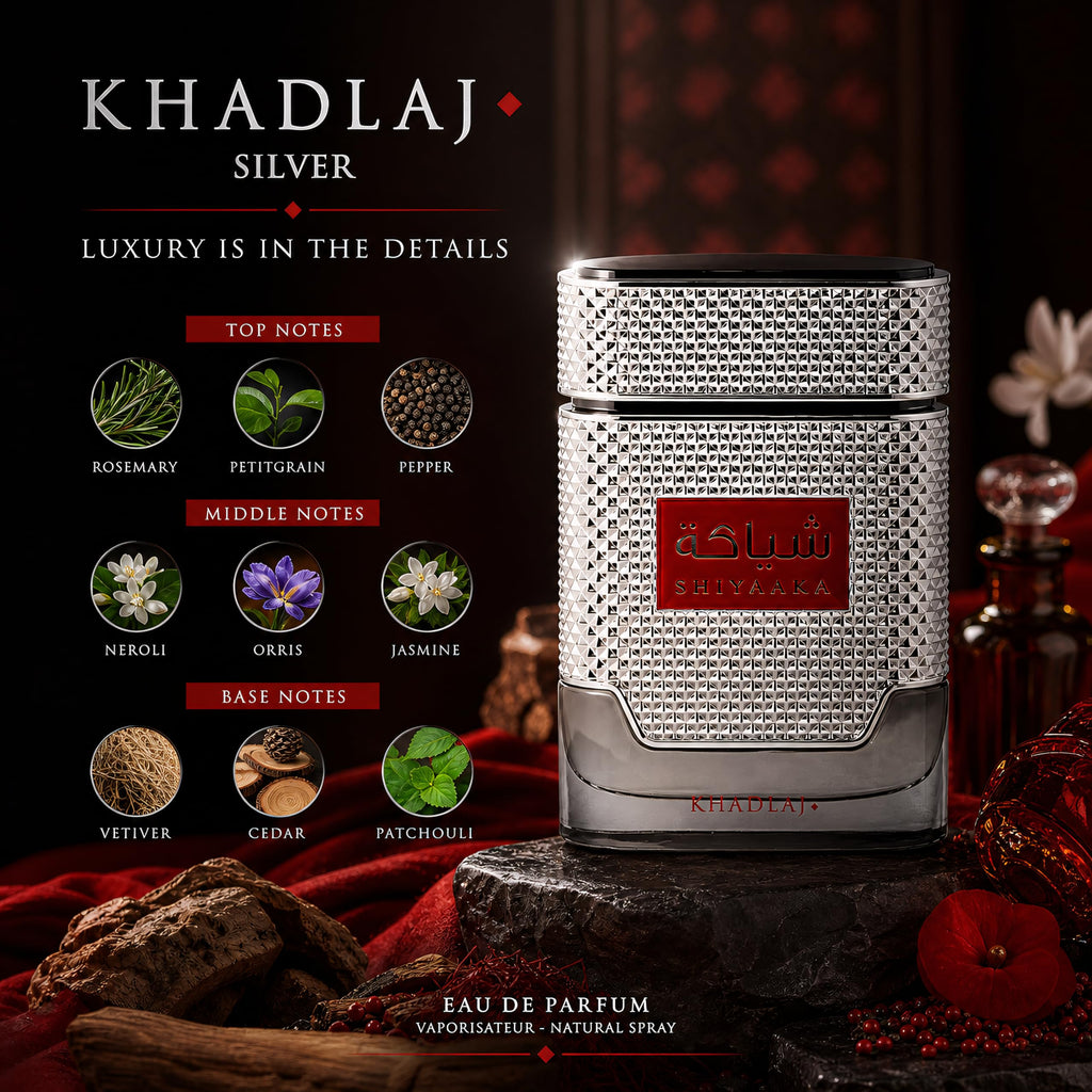 Khadlaj Shiyaaka Snow perfume features a luxurious silver bottle and rich citrusy, woody fragrance. Verified by CuratCart.