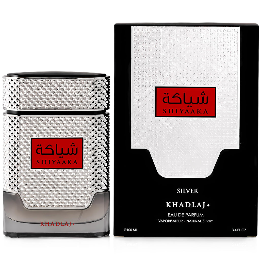 Khadlaj Shiyaaka Snow perfume in stylish silver bottle, encased in elegant box. Verified by CuratCart for trust.