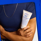 Kiehl's Ultimate Strength Hand Salve shown on a model's arm. Available for order online now, perfect for dry hands.