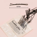 Kitsch Bobby Pins in a resealable bag, ideal for styling blonde hair. Trusted by CuratCart. Each pin measures 1.875 inches.