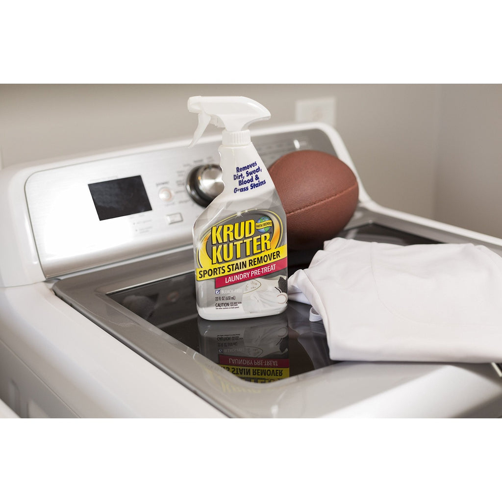 Krud Kutter Sports Stain Remover in high-quality packaging on a washing machine, ideal for tackling tough sports stains. Available at Curat Cart.