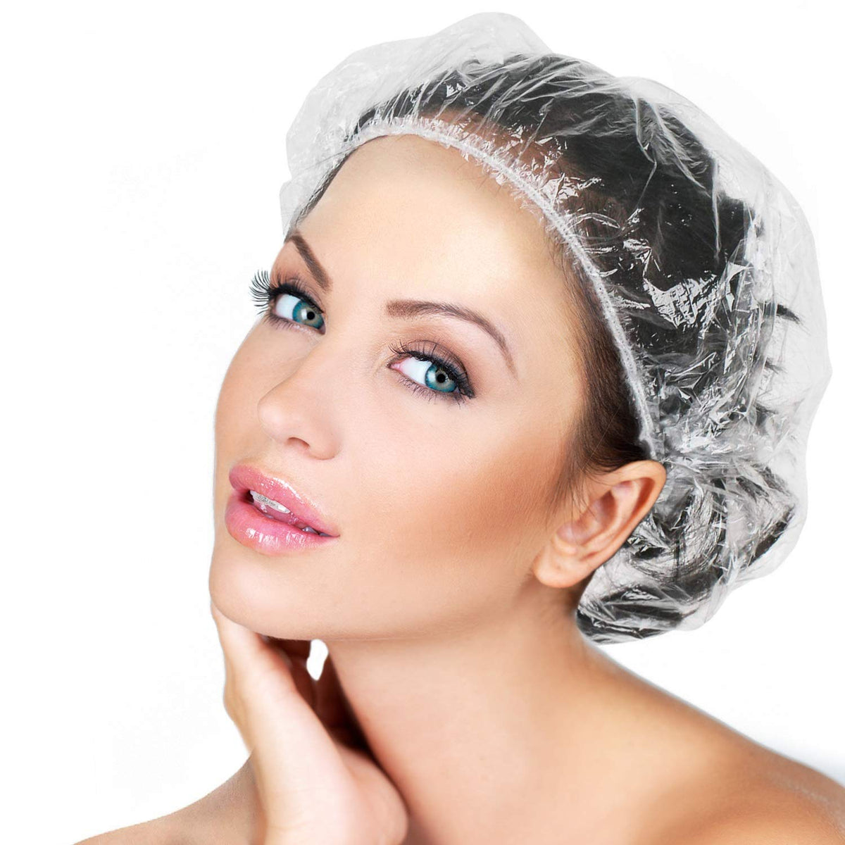 Larger disposable shower caps showcased on a model, highlighting comfort and style for effective hair protection.