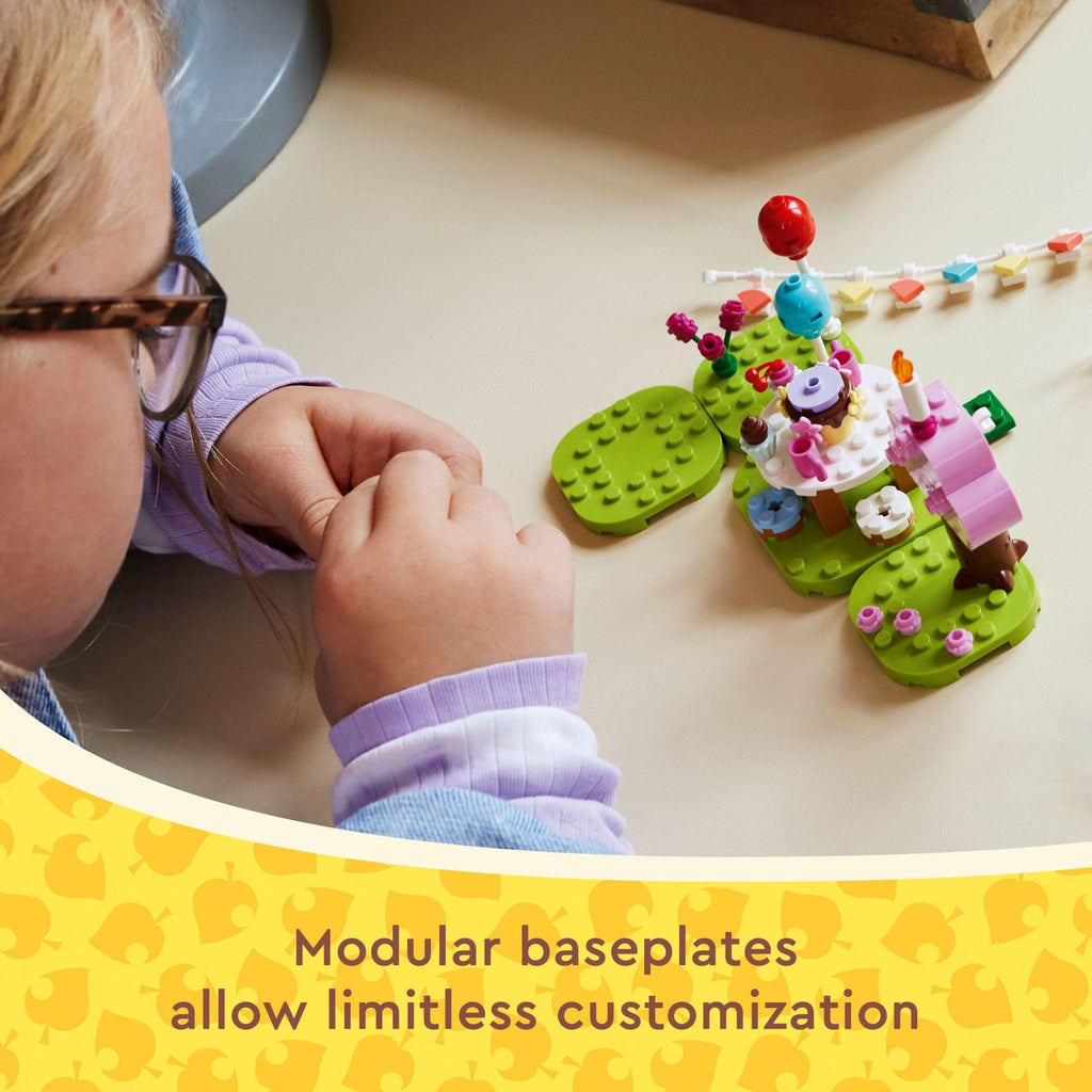 A child assembles a colorful LEGO birthday scene featuring modular baseplates, flowers, and balloons. Verified by CuratCart.