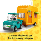 LEGO set featuring a teal car and vibrant orange caravan for creative role play. Verified by CuratCart for quality.