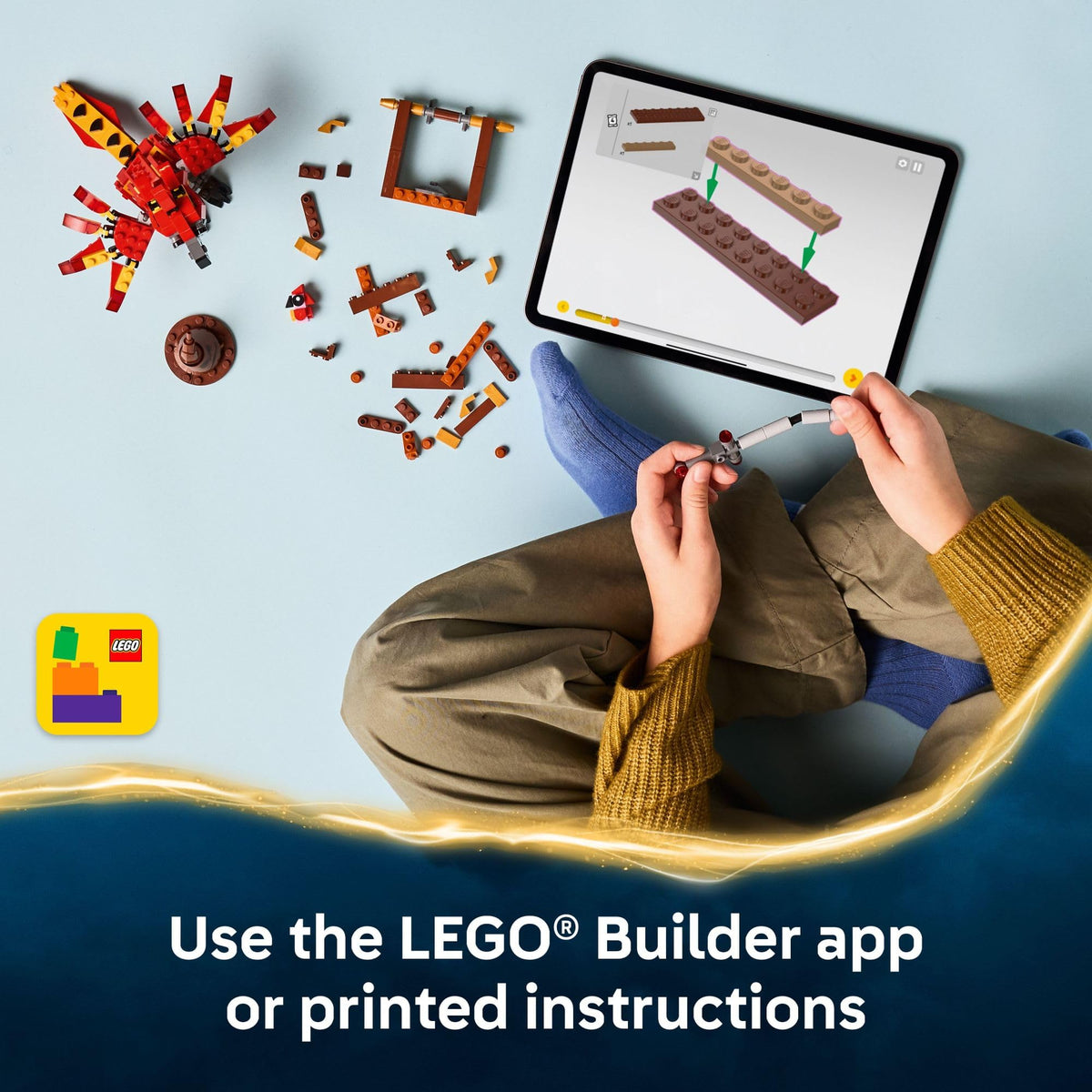Authentic LEGO Harry Potter Fawkes set shown, with tablet using Builder app for assembling instructions.