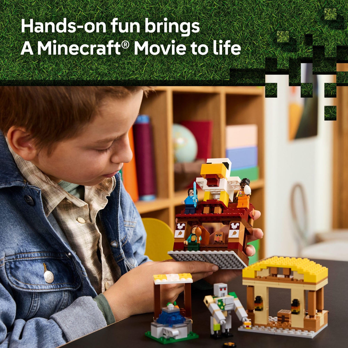 Boy exploring LEGO Minecraft Ghast Balloon Village, featuring colorful building designs and iconic characters.