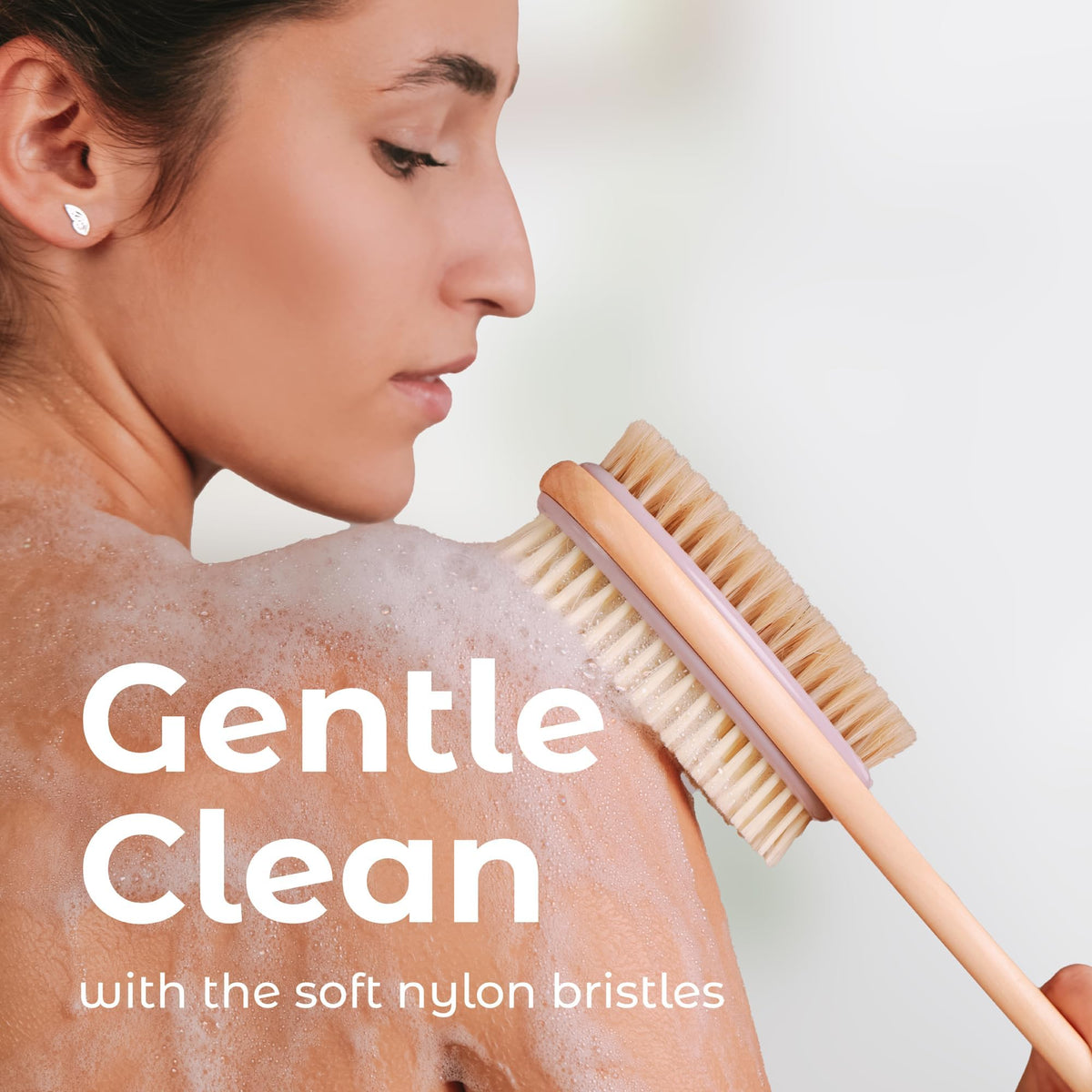 MainBasics Back Scrubber Shower Brush with soft nylon bristles, providing a gentle clean while enhancing your shower routine.