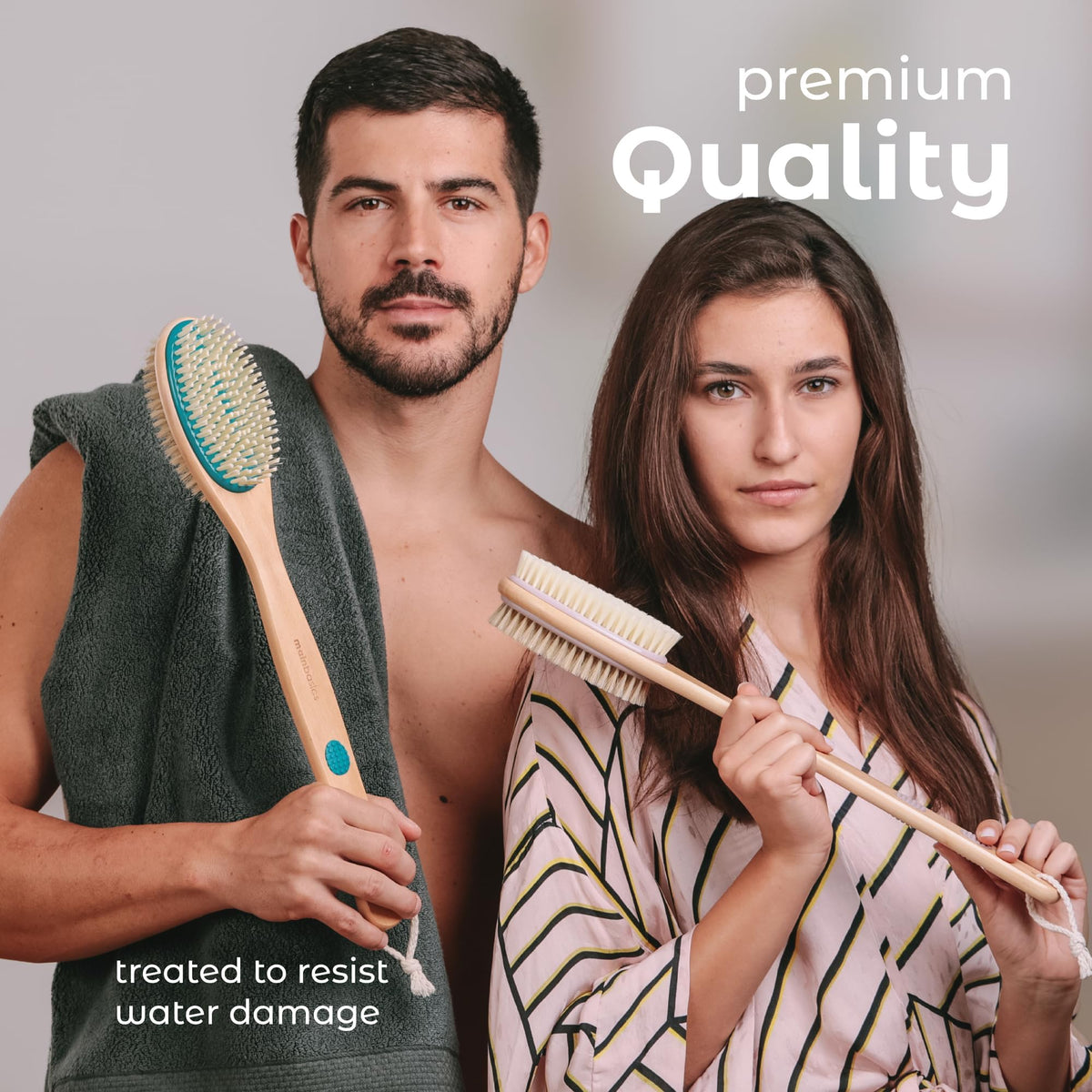 Stylish couple holding a premium back scrubber and shower brush. Treated to resist water damage for lasting use.