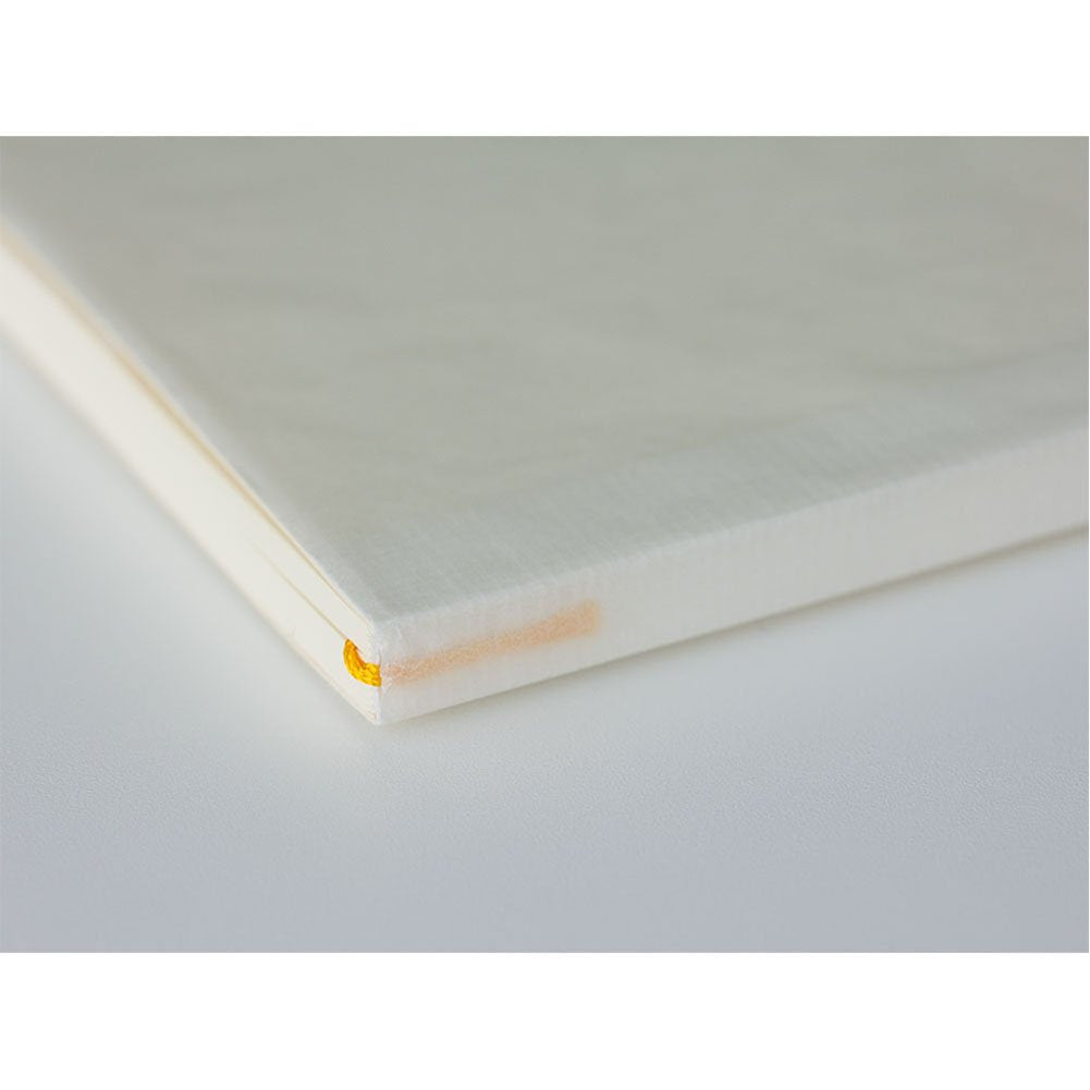 Experience the premium Midori MD A5 Plain Paper Notebook, 100% Authentic and available at Curat Cart in India.