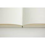 Discover the Midori MD A5 Plain Paper Notebook with high-quality, blank pages perfect for creative writing. Available at Curat Cart.