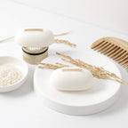 Mimosu Clarifying Rice Water Shampoo in premium packaging, displayed with natural elements. Available at Curat Cart.