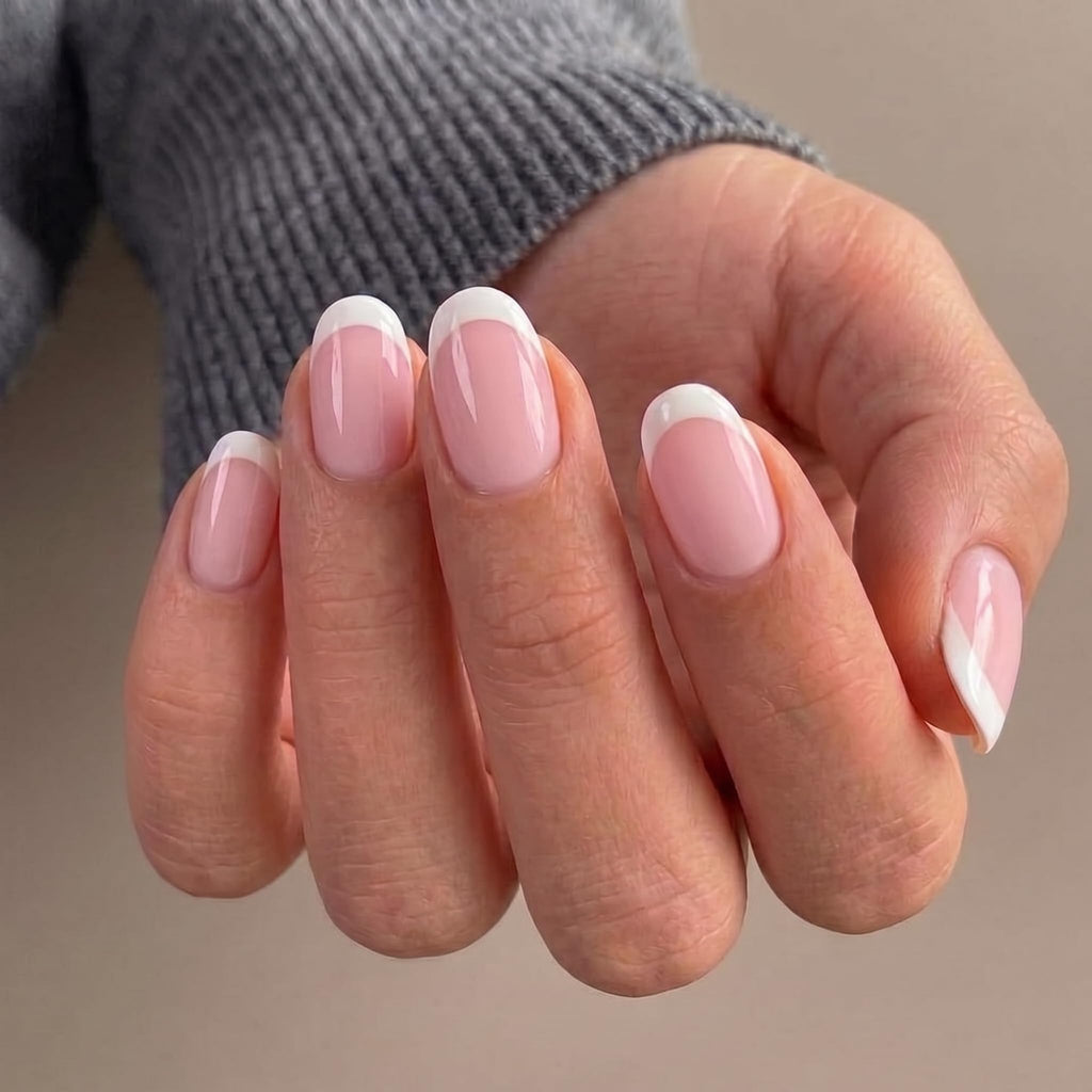 Stylish Misssix short French tip press on nails with a chic pink base and white tips, perfect for a polished look.