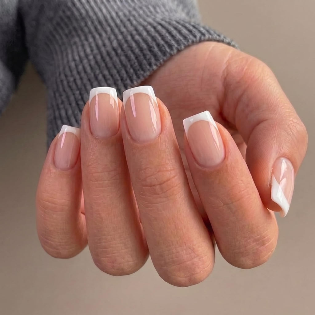 Authentic Misssix short French tip press-on nails, featuring elegant white tips on a natural base, perfect for effortless manicures.