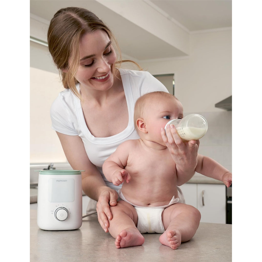 Experience the Momcozy Baby Bottle Warmer, specially curated by Curat Cart, ensuring perfect warmth for your baby's feed.