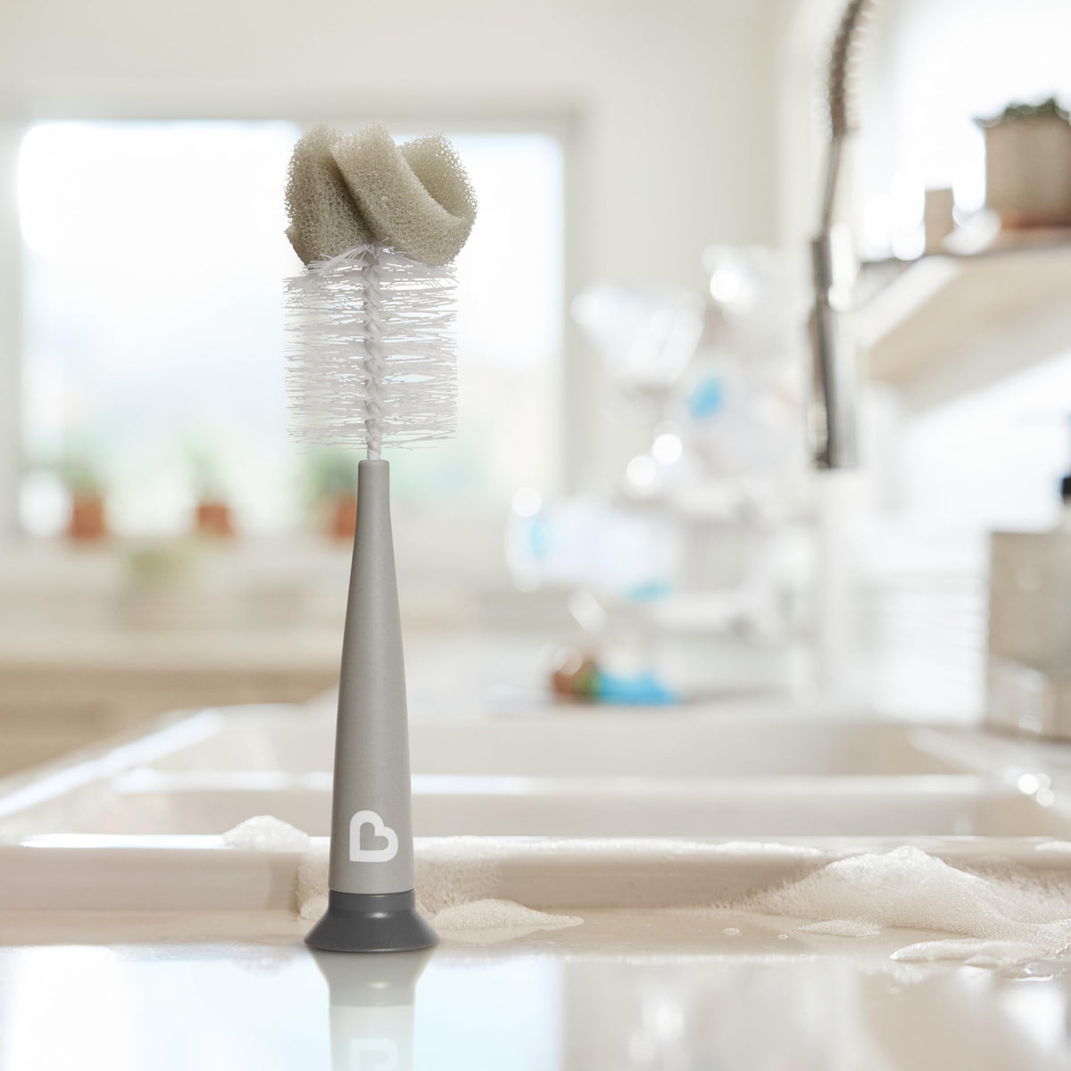 Munchkin Sponge Bottle Brush, perfect for cleaning bottles. Verified by CuratCart for trusted quality and performance.