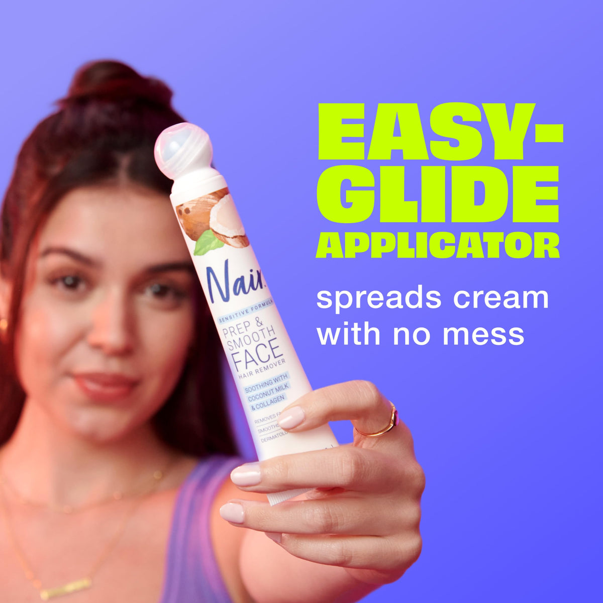 Nair Exfoliating Facial Hair Removal Cream with easy-glide applicator for mess-free application in original packaging.