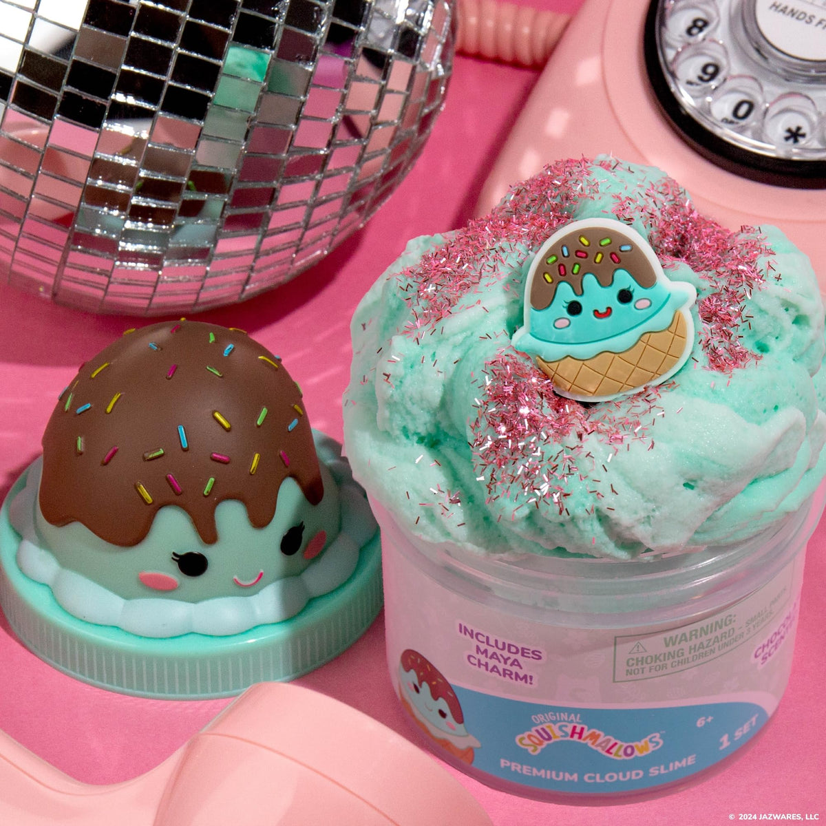 Discover the Original Squishmallows scented slime jar topped with a cute ice cream charm, vibrant colors, and sparkles.