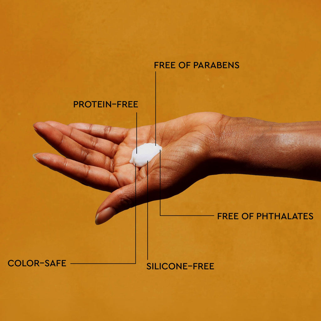 PATTERN Beauty curl cream shown on hand, highlighting features like silicone-free, color-safe, and protein-free formulas.