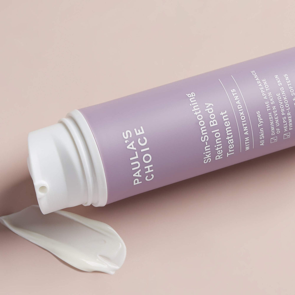 Discover Paula's Choice Skin-Smoothing Retinol Body Treatment, featuring original packaging and rich, creamy texture.