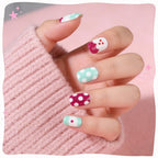 Stylish 26-piece French tip press-on nails featuring fun patterns. Verified by CuratCart for quality.