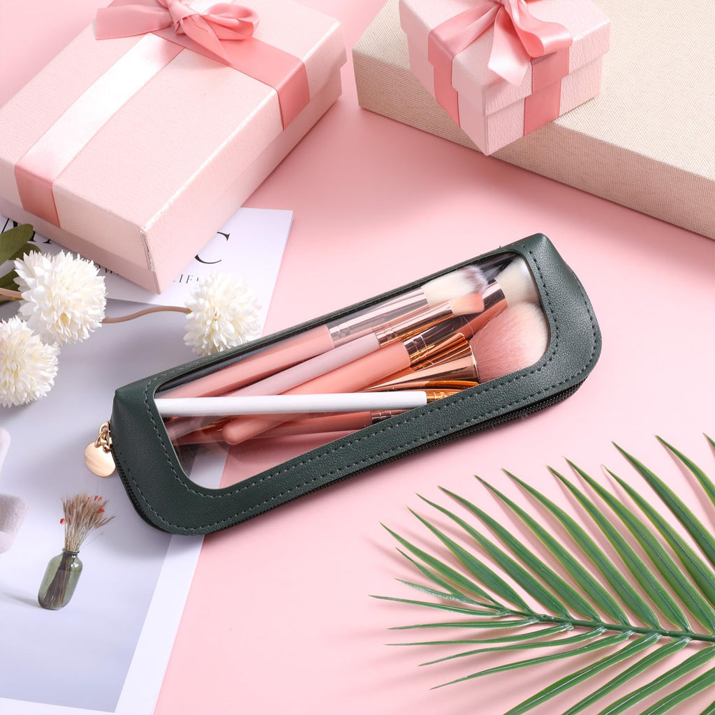 Stylish small clear makeup bag by Psyqtsuary, featuring brushes, perfect for organized beauty storage. Verified by CuratCart.