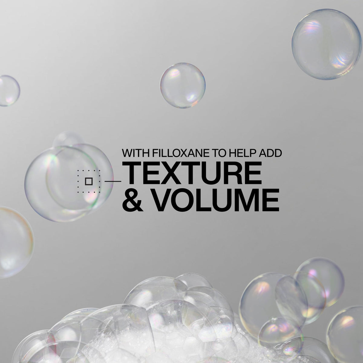 Redken Volume Injection Shampoo bubbles highlight Filloxane for enhanced texture and volume in hair care.
