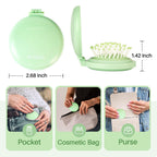 RHOS folding brush with mirror in mint green, perfect for pockets, bags, and on-the-go touch-ups. Official product.