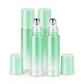 Set of 12 mint green roller bottles for essential oils featuring stainless steel roller balls. Verified by CuratCart.
