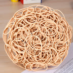 Versatile beige rubber bands, perfect for daily use. Get organized effortlessly with 300pcs from Curat Cart.