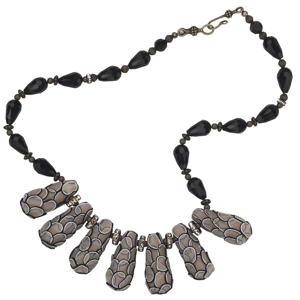 Stylish necklace crafted with Sculpey Premo Polymer Clay, showcasing unique designs and high-quality finish, available at Curat Cart.