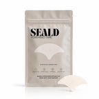 SEALD™ Forehead Tape pack with individual patches for wrinkle smoothing, designed for authentic skincare routines.