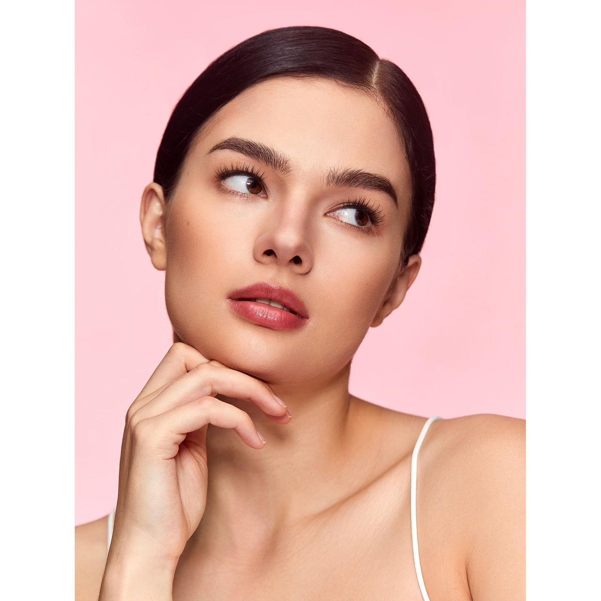 Model with flawless skin demonstrating SHEGLAM Fine Line 2-In-1 Nose Contour & highlighter, a premium imported beauty essential.