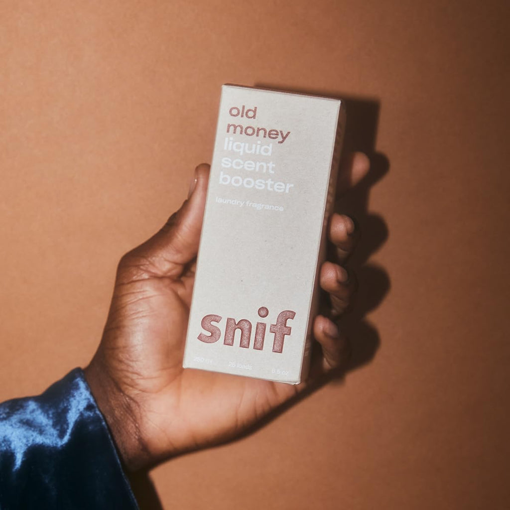 Snif Old Money Laundry Scent Booster offers a luxurious fragrance experience. Premium import available at Curat Cart.