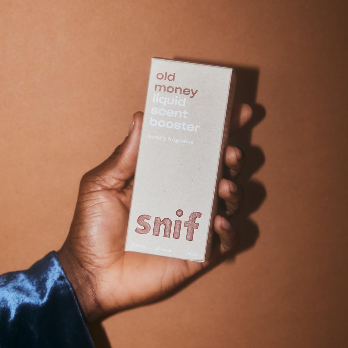 Snif Old Money Laundry Scent Booster offers a luxurious fragrance experience. Premium import available at Curat Cart.