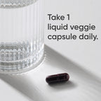 Premium Sports Research Iron Biglycinate capsule next to a glass, showcasing high-quality packaging at Curat Cart.