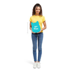 A girl in a yellow shirt holds a 10-inch Squishmallows Harry Potter plush. Verified by CuratCart for quality.