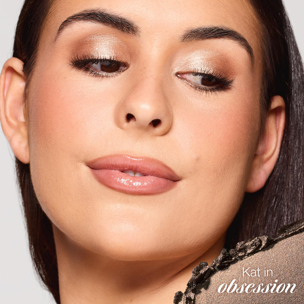 A model showcases the tarte smolderEYES shadow liner, complementing her glossy lips. Verified by CuratCart.