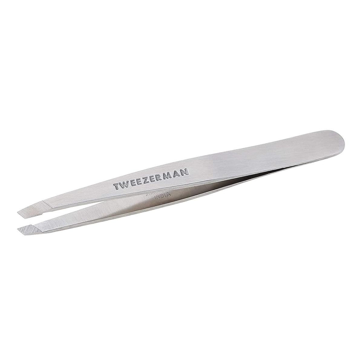 Tweezerman Stainless Steel Slant Tweezer - Front Packaging Displaying Tweezerman Tweezer | Authentic Curat Cart Stock