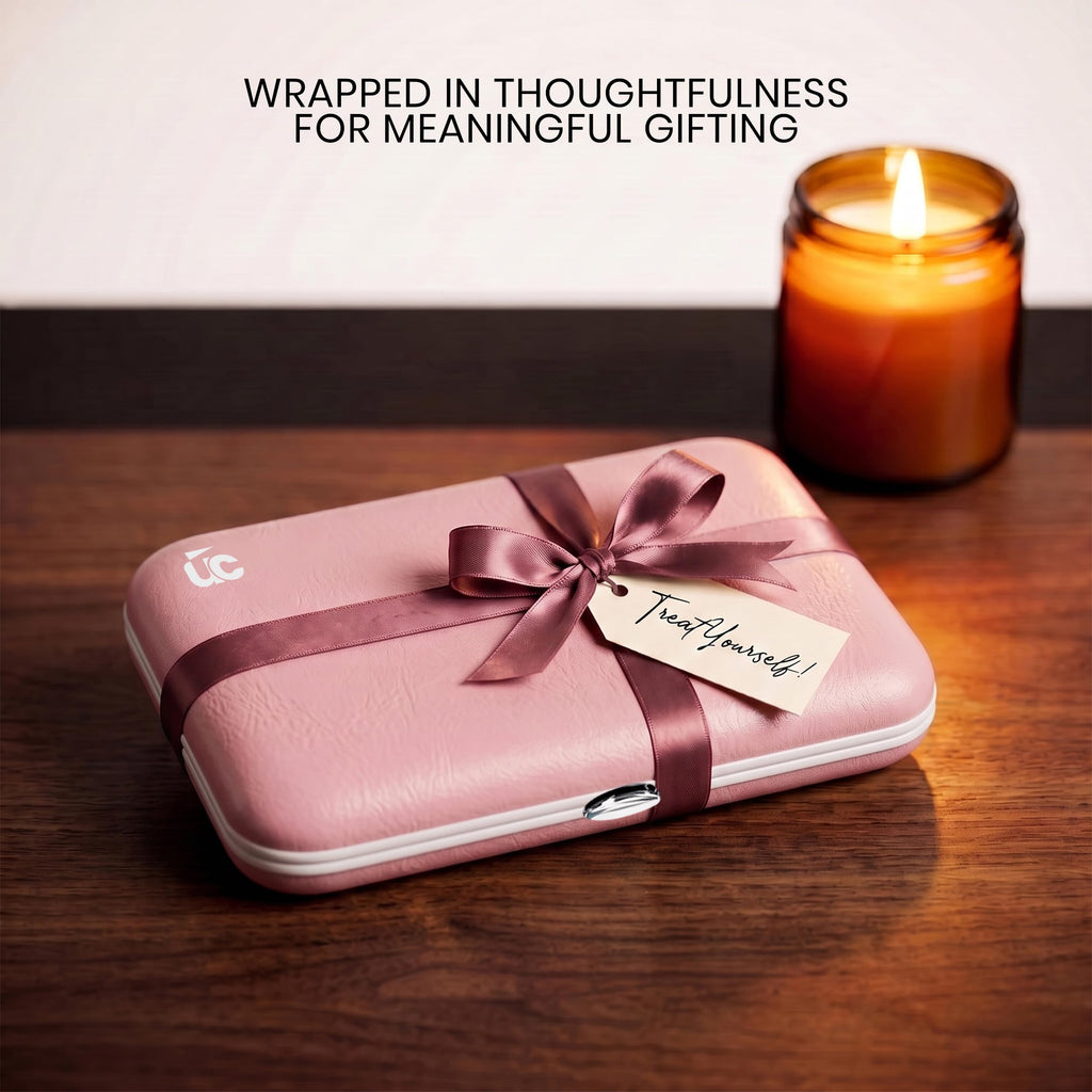 Stylishly packaged Utopia Care Manicure Set in pink, featuring a bow, ideal for meaningful gifting. Treat yourself with elegance.