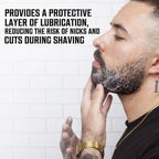 A man using Viking Revolution Shaving Soap, showcasing its protective lubrication for a smooth shave.