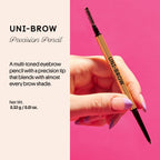 WINKY LUX Uni-Brow Eyebrow Pencil in hand, perfect for precise brow coloring. Available online, order now!