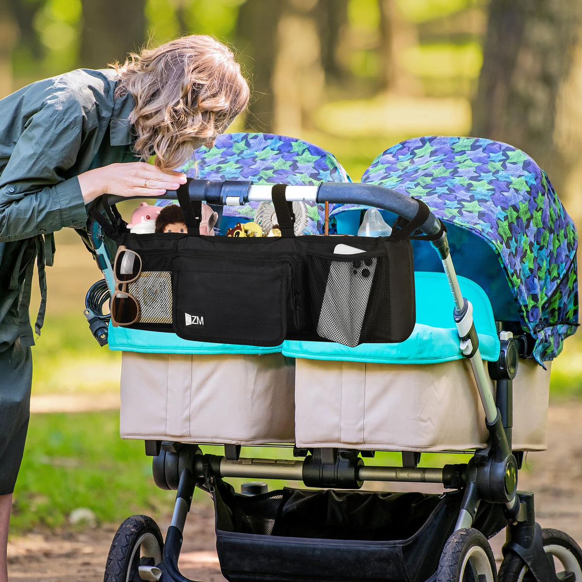 Discover the premium imported ZZM Double Stroller Organizer, designed for convenience and style. Available at Curat Cart.