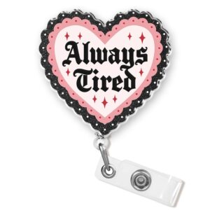 Always Tired Badge Reel, a premium import from Curat Cart, adds humor to your ID display with its charming heart design.