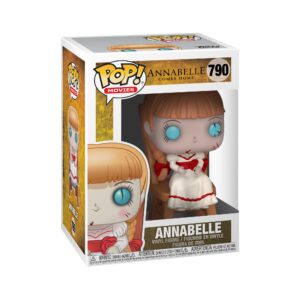 Authentic Funko POP! Annabelle figure seated in a chair, showcasing her iconic look from 'The Conjuring' universe.