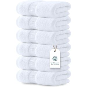 Experience the softness of 100% genuine luxury white hand towels, perfect for a spa-like feel in your home.