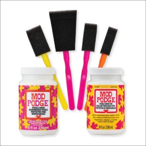 Authentic Mod Podge Puzzle Saver Kit with two brushes and two bottles, perfect for preserving your puzzles.